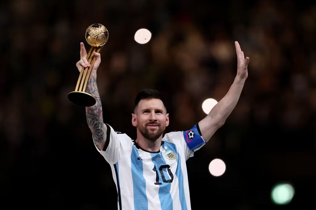 Lionel-Messi-of-Argentina-poses-with-the-adidas-Golden-Ball-after-the-FIFA-World-Cup-Qatar-2022-final-against-France
